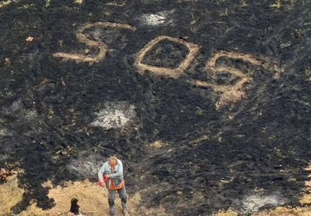 Homem Salvo de Incêndio em Ilha Após Usar Sinalizador para Pedir Ajuda