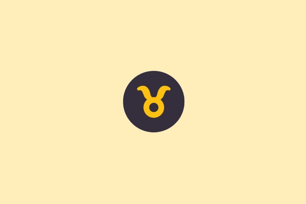 Um símbolo do signo de Touro em amarelo, dentro de um círculo escuro, sobre um fundo claro bege
